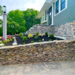 Chelmsford-hardscape-design-veneer-stone-foundation-wall-steps-1024x768